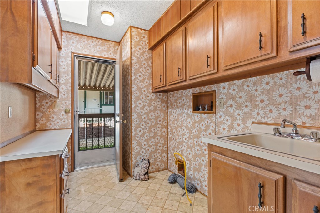 Laundry room - 5200 Irvine Blvd 61, Irvine CA 92620 - photo 14