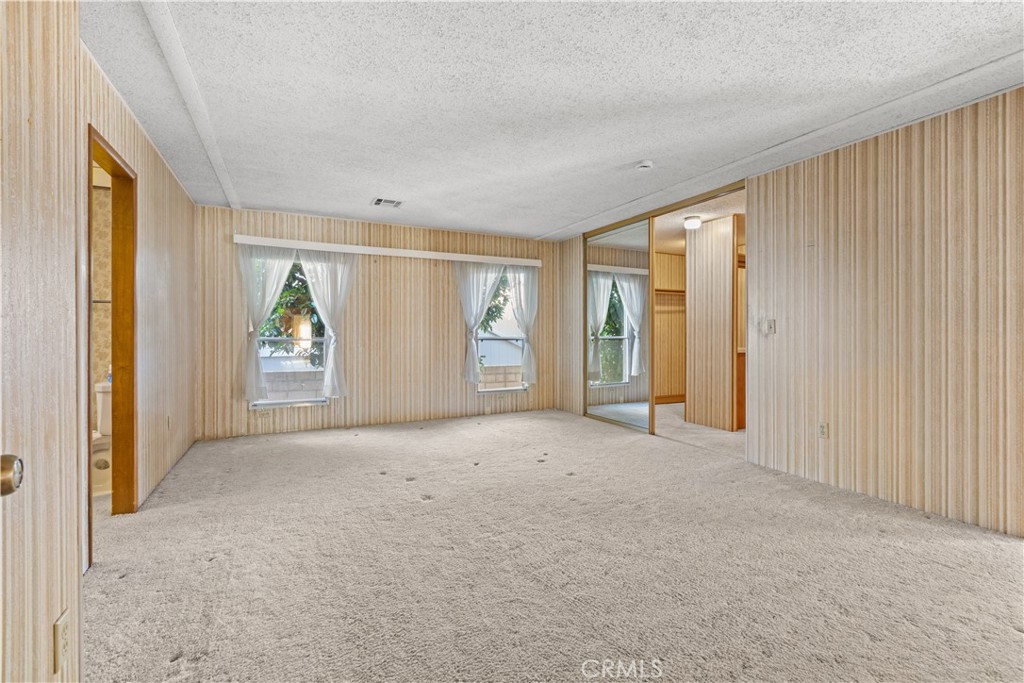 Primary bedroom - 5200 Irvine Blvd 61, Irvine CA 92620 - photo 16