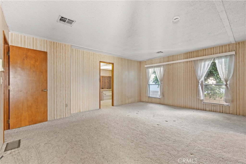 Primary bedroom - 5200 Irvine Blvd 61, Irvine CA 92620 - photo 17