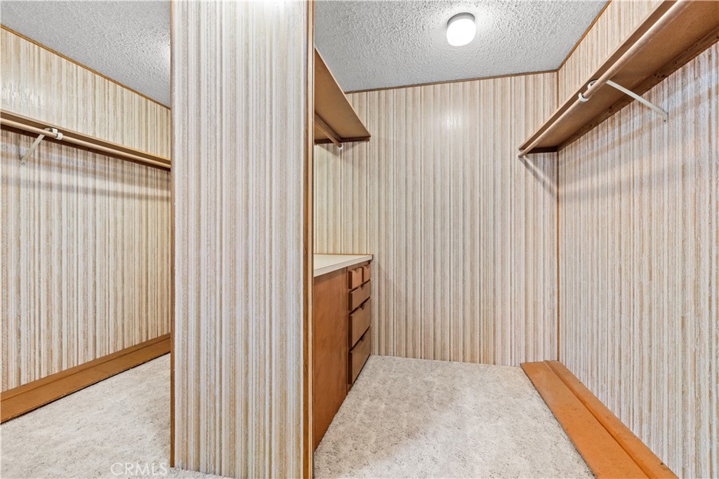 Walk-in closet - 5200 Irvine Blvd 61, Irvine CA 92620 - photo 18
