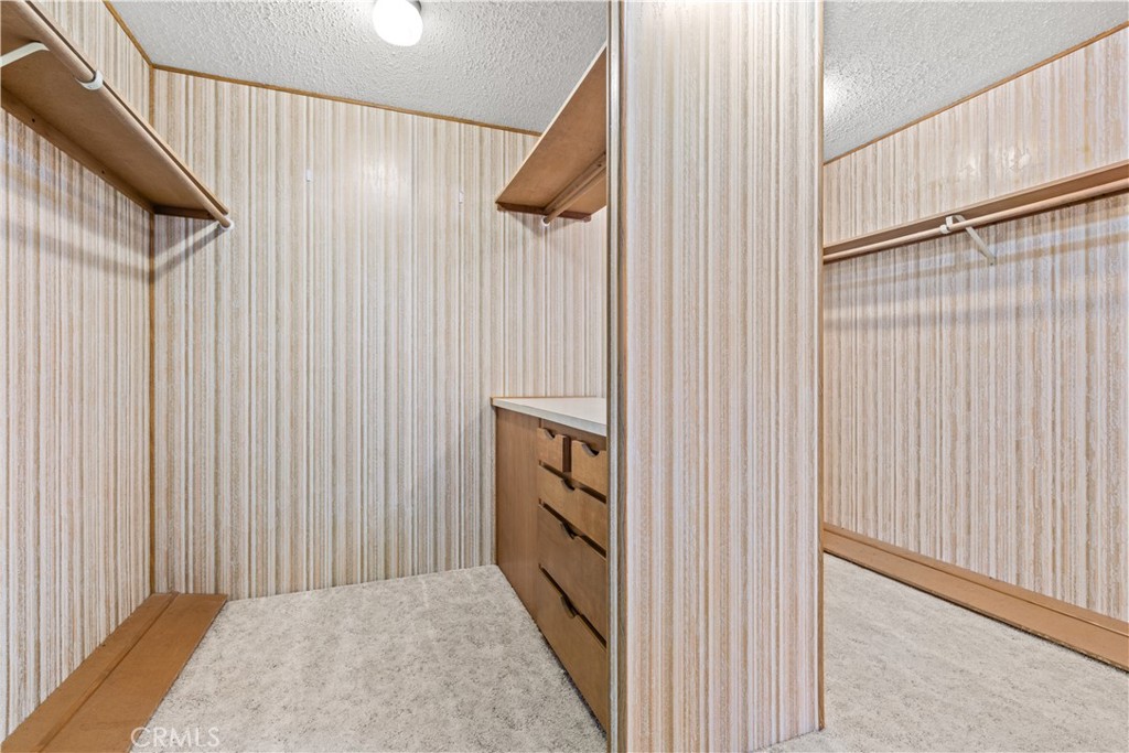 Walk-in closet - 5200 Irvine Blvd 61, Irvine CA 92620 - photo 19