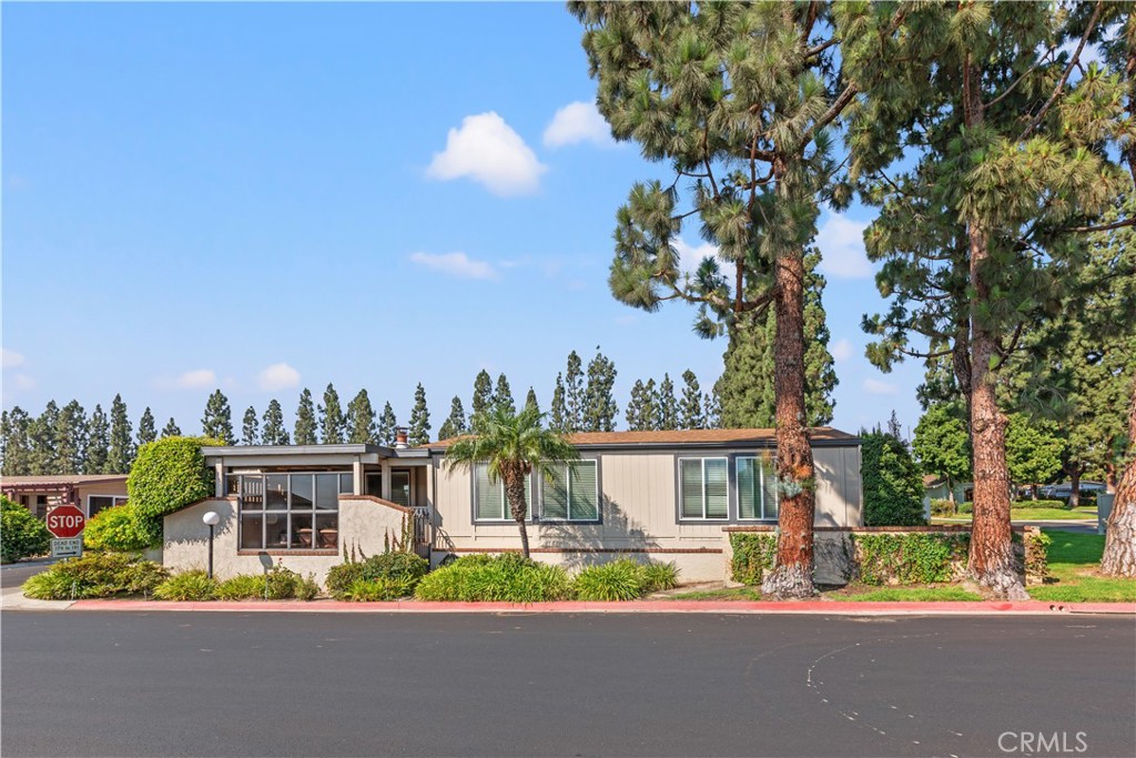 Exterior side view - 5200 Irvine Boulevard 179, Irvine CA 92620 - photo 2