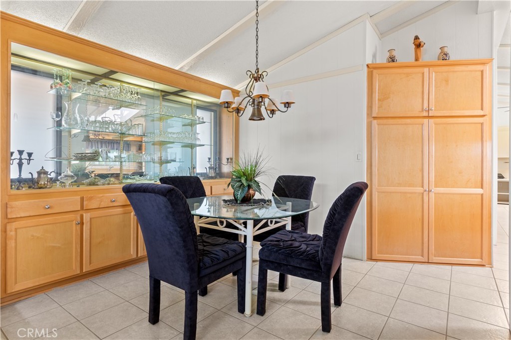 Dining with built-in cabinetry - 5200 Irvine Boulevard 179, Irvine CA 92620 - photo 12