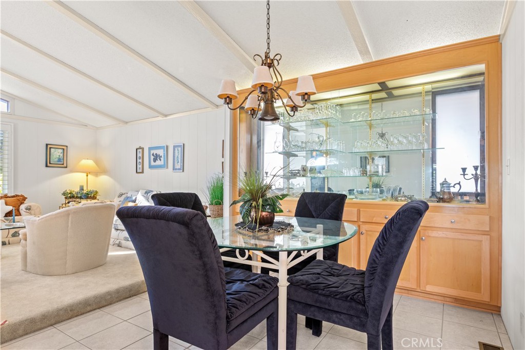 Dining with built-in cabinetry - 5200 Irvine Boulevard 179, Irvine CA 92620 - photo 13
