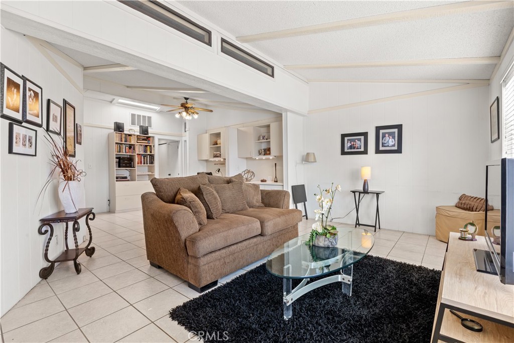Family Room - 5200 Irvine Boulevard 179, Irvine CA 92620 - photo 22