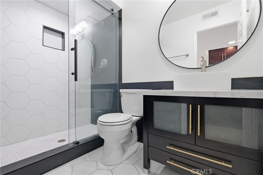 Downstairs bathroom - 54 Oval Road, Irvine CA 92604 - photo 11