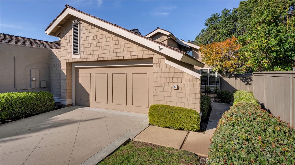 Fantastic Craftsman design. A driveway you may park in too! - 57 Pinewood, Irvine CA 92604 - photo 1