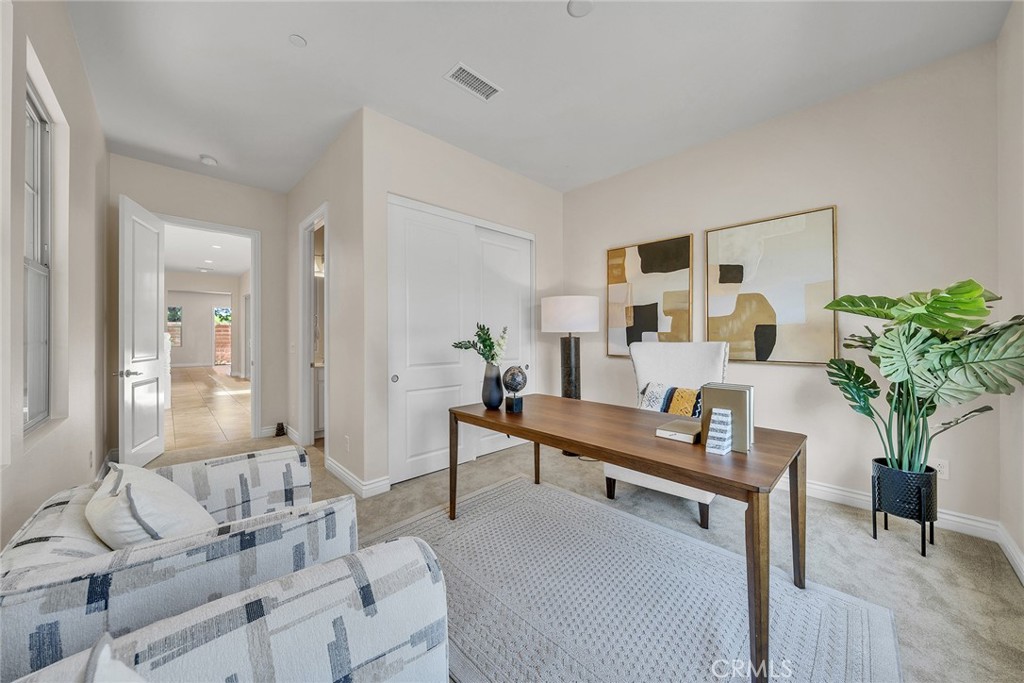 Ground Level Bedroom With Ensuite Bathroom. It's decorated as an office in the picture. - 60 Sherwood, Irvine CA 92620 - photo 26