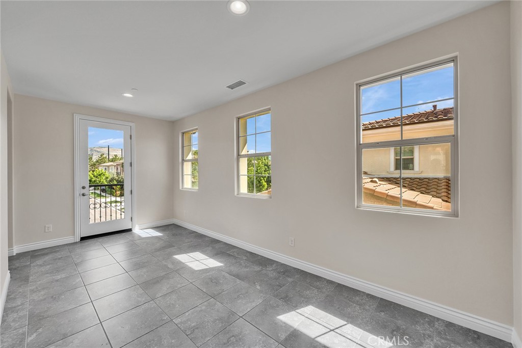 secondary suite includes a covered space just off the bedroom, creating a seamless indoor-outdoor extension ideal for re - 60 Sherwood, Irvine CA 92620 - photo 41