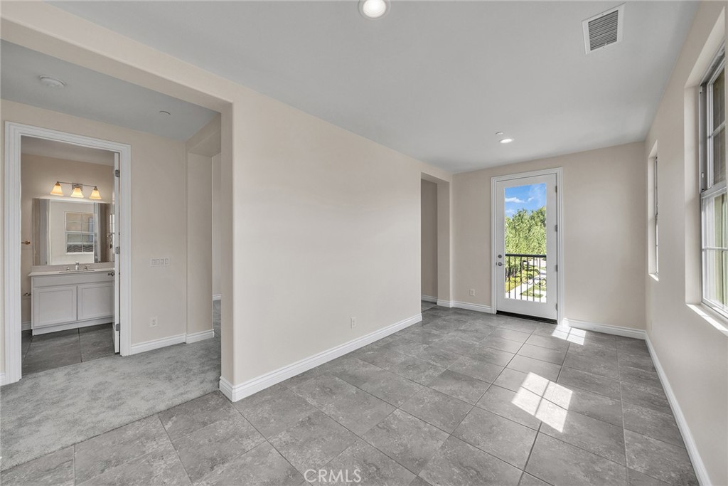 secondary suite includes a covered space just off the bedroom, creating a seamless indoor-outdoor extension ideal for re - 60 Sherwood, Irvine CA 92620 - photo 42