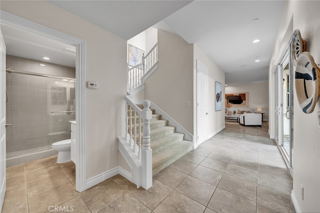 The lower-level bathroom is equipped with a walk-in shower. - 60 Sherwood, Irvine CA 92620 - photo 54