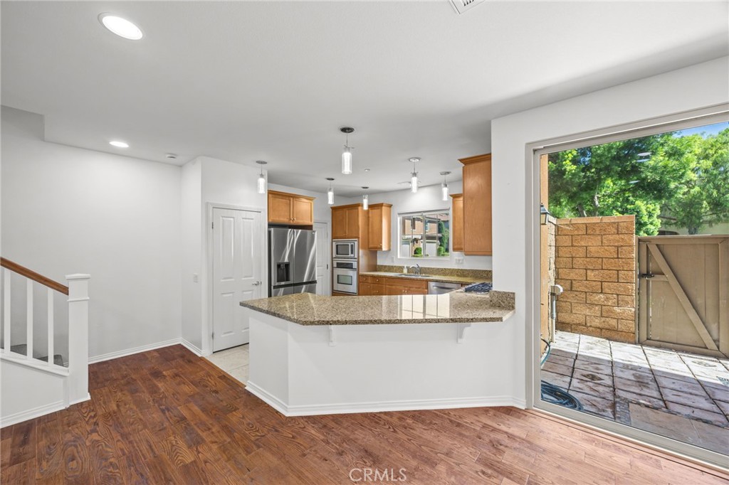 Kitchen Penisula View from the Family Room - 61 Distant Star, Irvine CA 92618 - photo 12