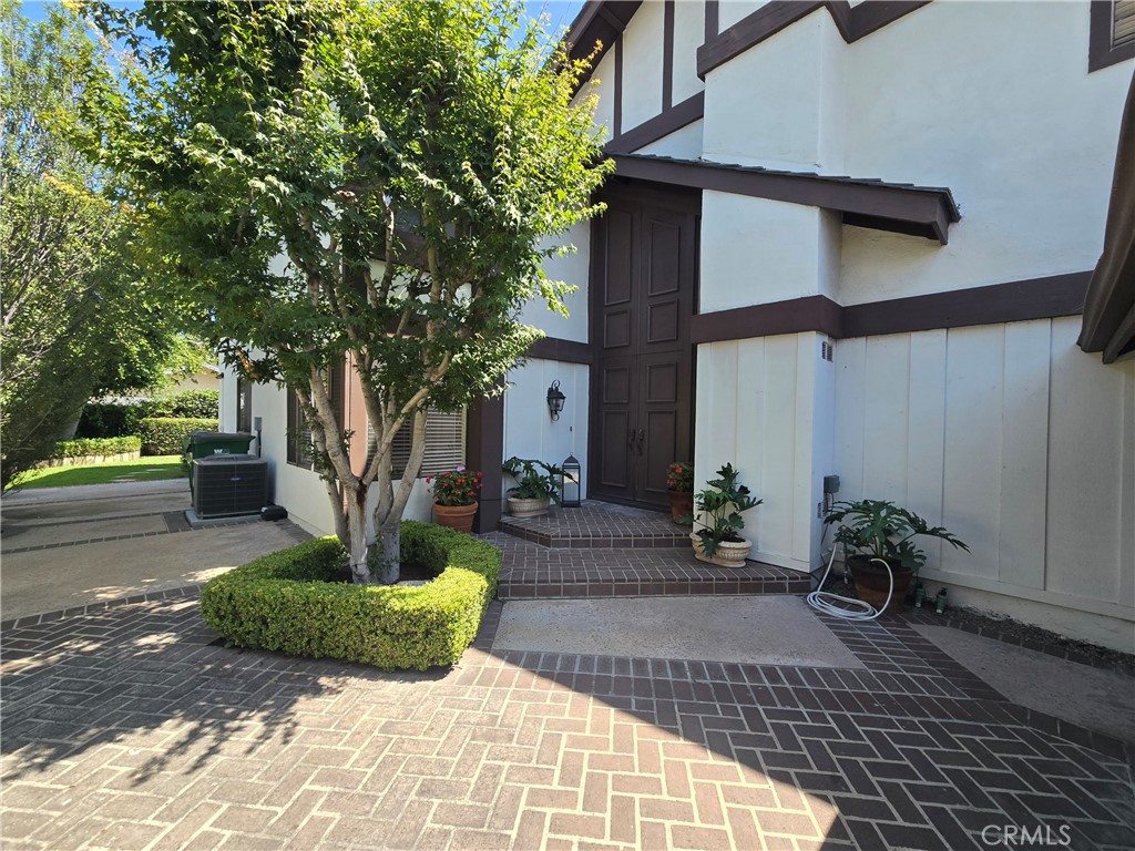 Gorgeous entry and brick patios - 63 Nighthawk, Irvine CA 92604 - photo 1