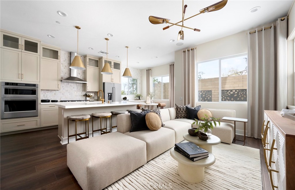 Photos uploaded are of the model representing the floor plan and are to demonstrate furniture layout. Furniture pictured - 640 Gadwall, Irvine CA 92618 - photo 10