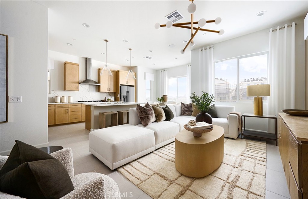 Photos uploaded are of the model representing the floor plan and are to demonstrate furniture layout. Furniture pictured - 648 Gadwall, Irvine CA 92618 - photo 6