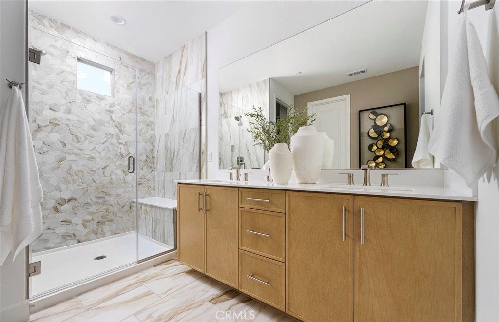 Photos uploaded are of the model representing the floor plan and are to demonstrate furniture layout. Furniture pictured - 648 Gadwall, Irvine CA 92618 - photo 10