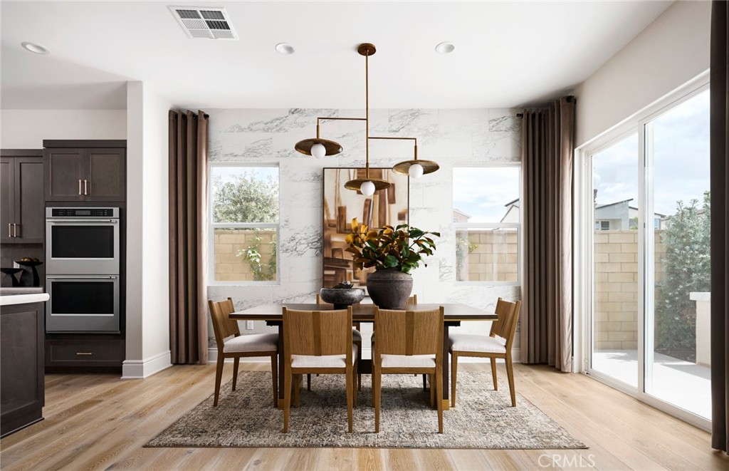 Photos uploaded are of the model representing the floor plan and are to demonstrate furniture layout. Furniture pictured - 652 Gadwall, Irvine CA 92618 - photo 6