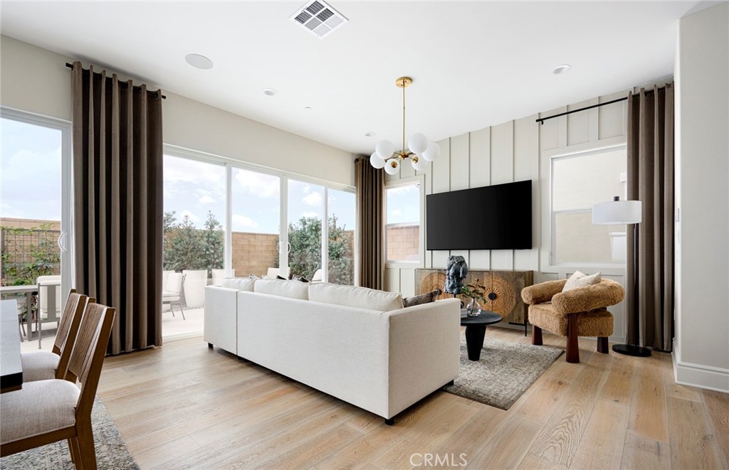 Photos uploaded are of the model representing the floor plan and are to demonstrate furniture layout. Furniture pictured - 652 Gadwall, Irvine CA 92618 - photo 7