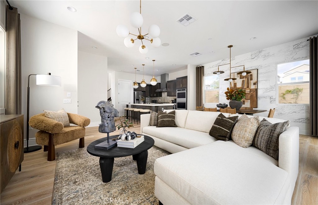 Photos uploaded are of the model representing the floor plan and are to demonstrate furniture layout. Furniture pictured - 652 Gadwall, Irvine CA 92618 - photo 8