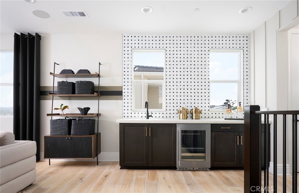 Photos uploaded are of the model representing the floor plan and are to demonstrate furniture layout. Furniture pictured - 652 Gadwall, Irvine CA 92618 - photo 15
