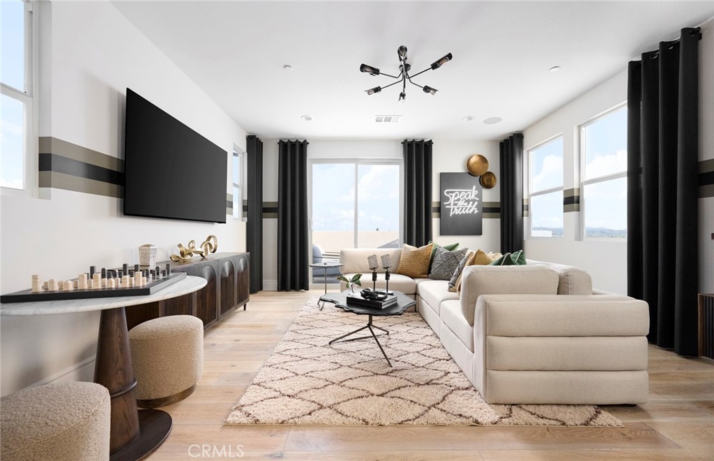 Photos uploaded are of the model representing the floor plan and are to demonstrate furniture layout. Furniture pictured - 652 Gadwall, Irvine CA 92618 - photo 16