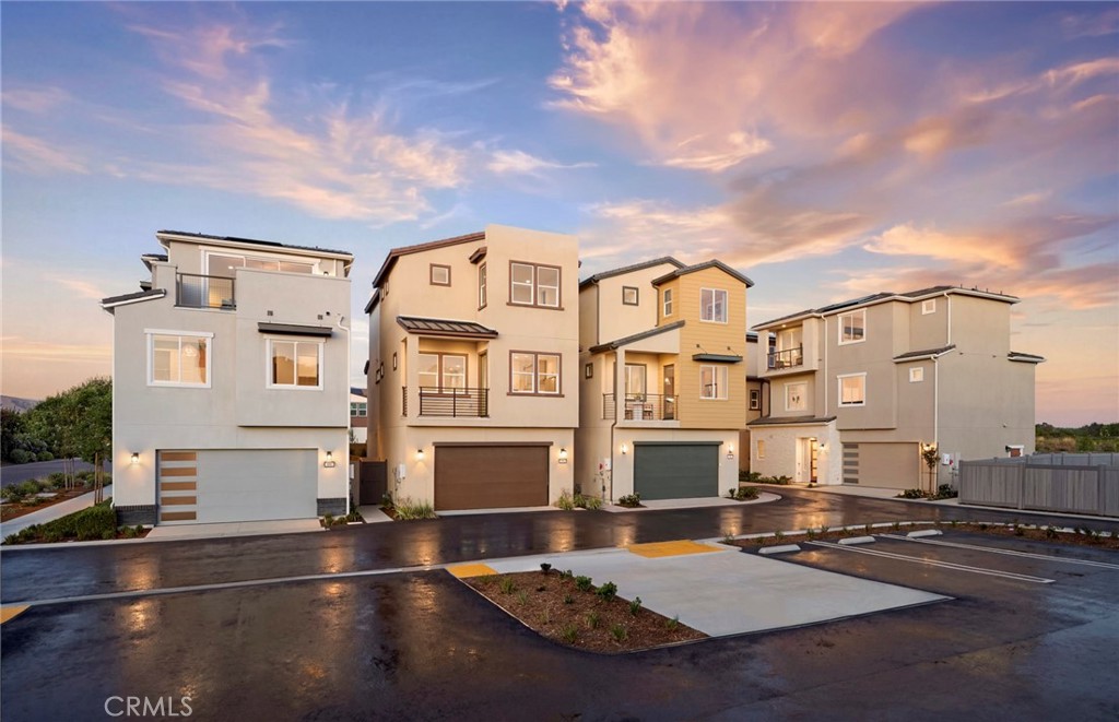Photos uploaded are of the model representing the floor plan and are to demonstrate furniture layout. Furniture pictured - 656 Gadwall, Irvine CA 92618 - photo 1
