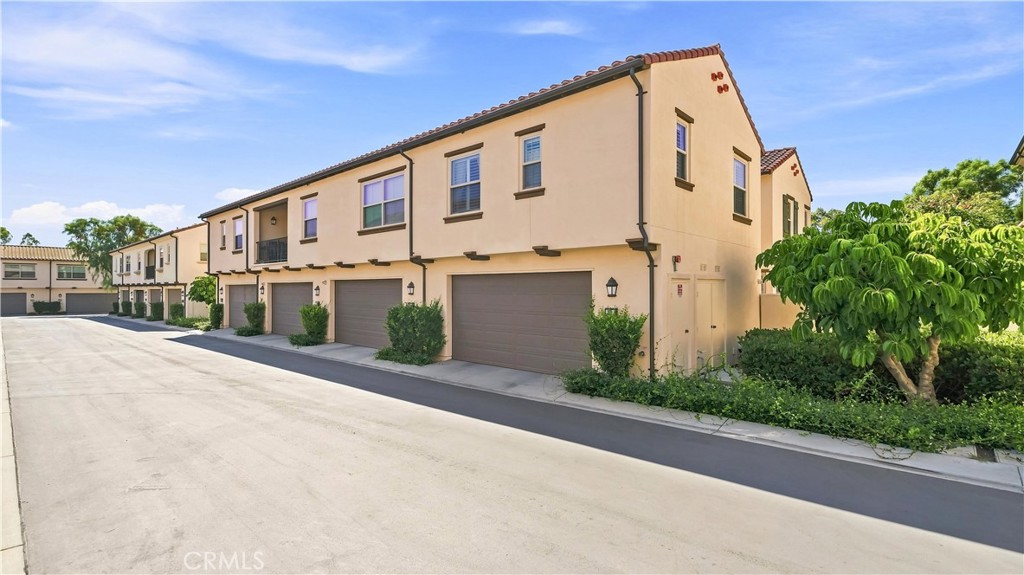 Attached Garage Exterior - 66 Fairymoss, Irvine CA 92620 - photo 28