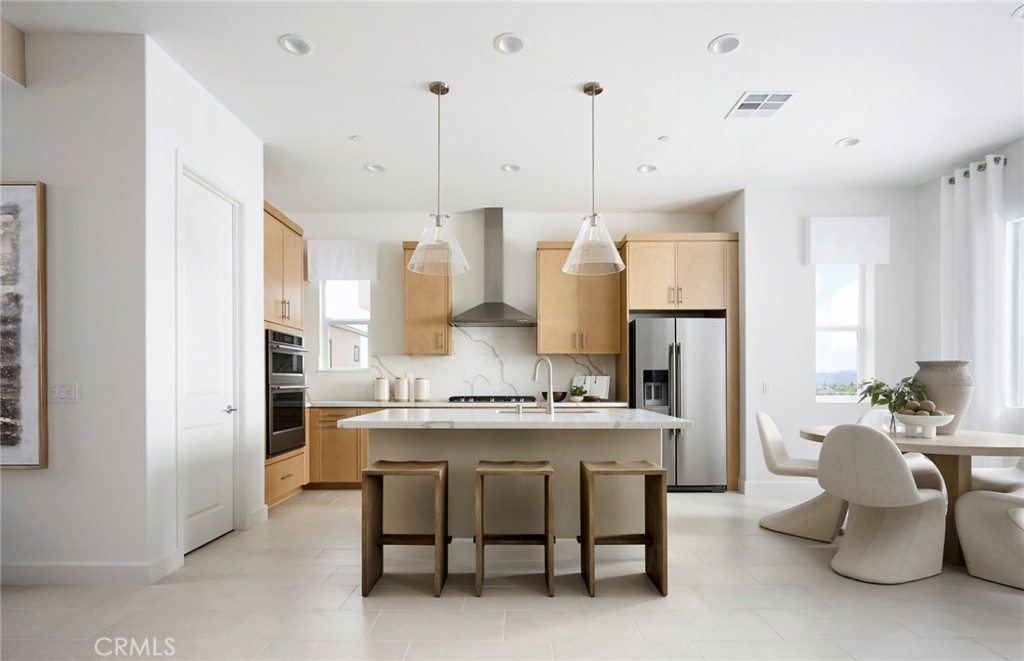 Photos uploaded are of the model representing the floor plan and are to demonstrate furniture layout. Furniture pictured - 672 Gadwall, Irvine CA 92618 - photo 2