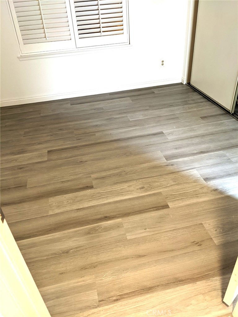 New Flooring in Bedrooms - 69 Abrazo Aisle 127, Irvine CA 92614 - photo 7