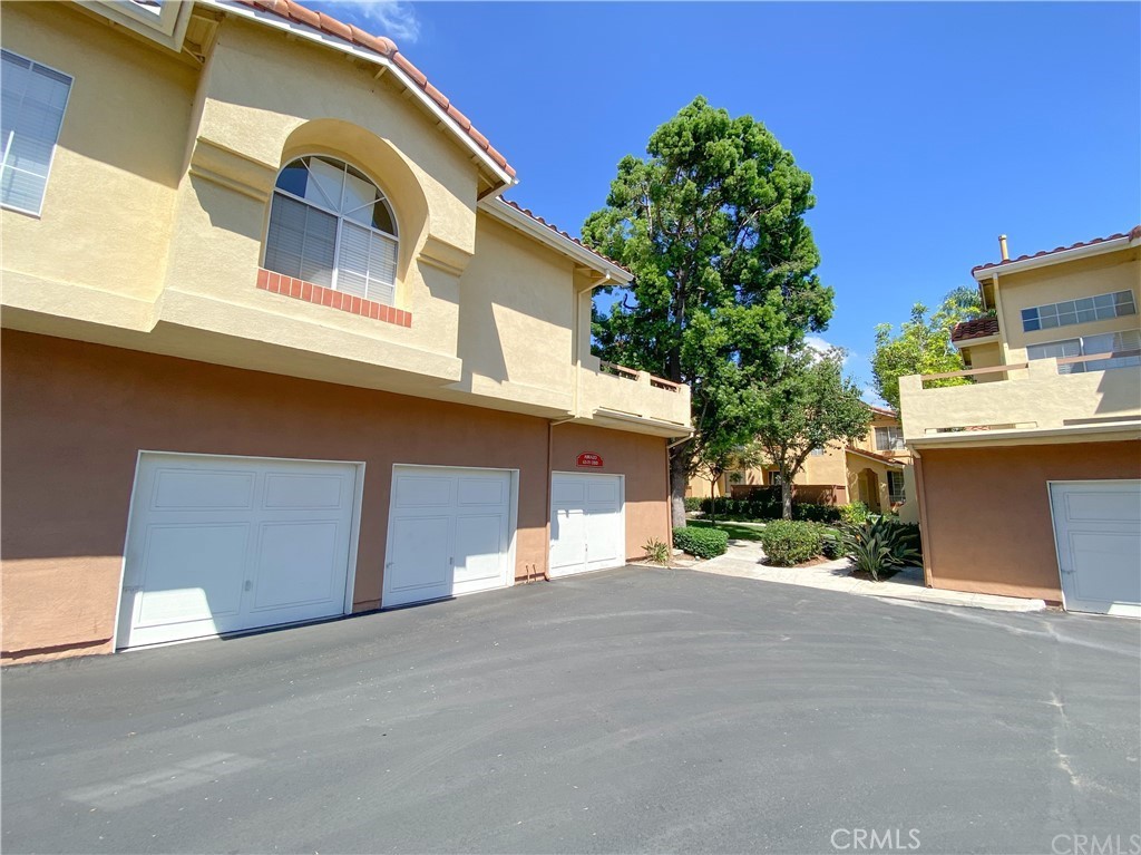 Garage - 69 Abrazo Aisle 127, Irvine CA 92614 - photo 8