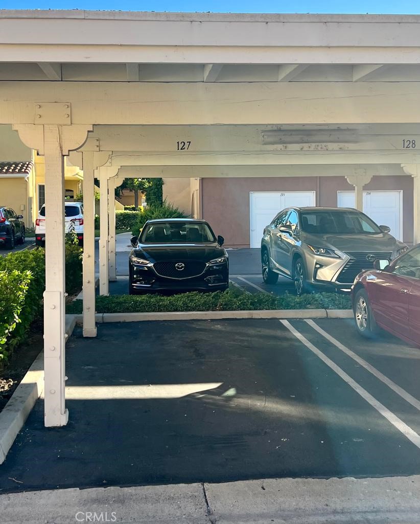 Carport - 69 Abrazo Aisle 127, Irvine CA 92614 - photo 9