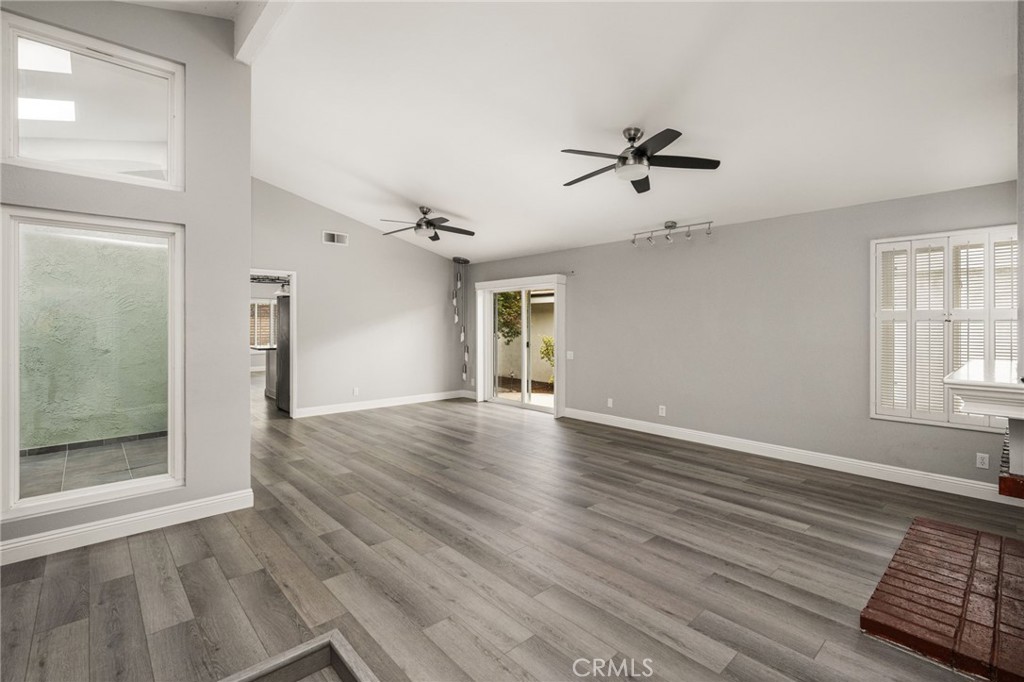 Veiw from the entry to the living room and beyond. Look at those gorgeous floors! - 7 Atlanta, Irvine CA 92620 - photo 3