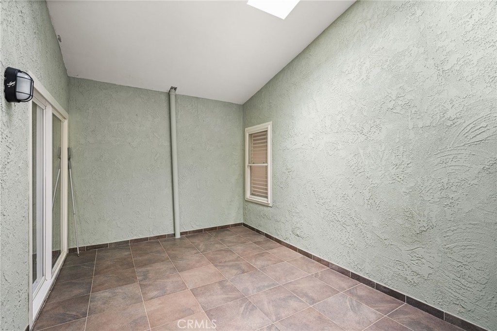 Fully enclosed atrium which can be added living space - 7 Atlanta, Irvine CA 92620 - photo 11