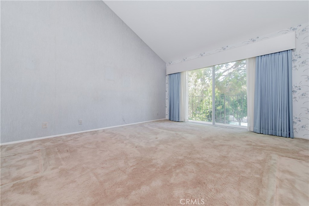 Expansive Primary En-Suite with Balcony overlooking community pool and green belt - 7 Del Rey 10, Irvine CA 92612 - photo 36
