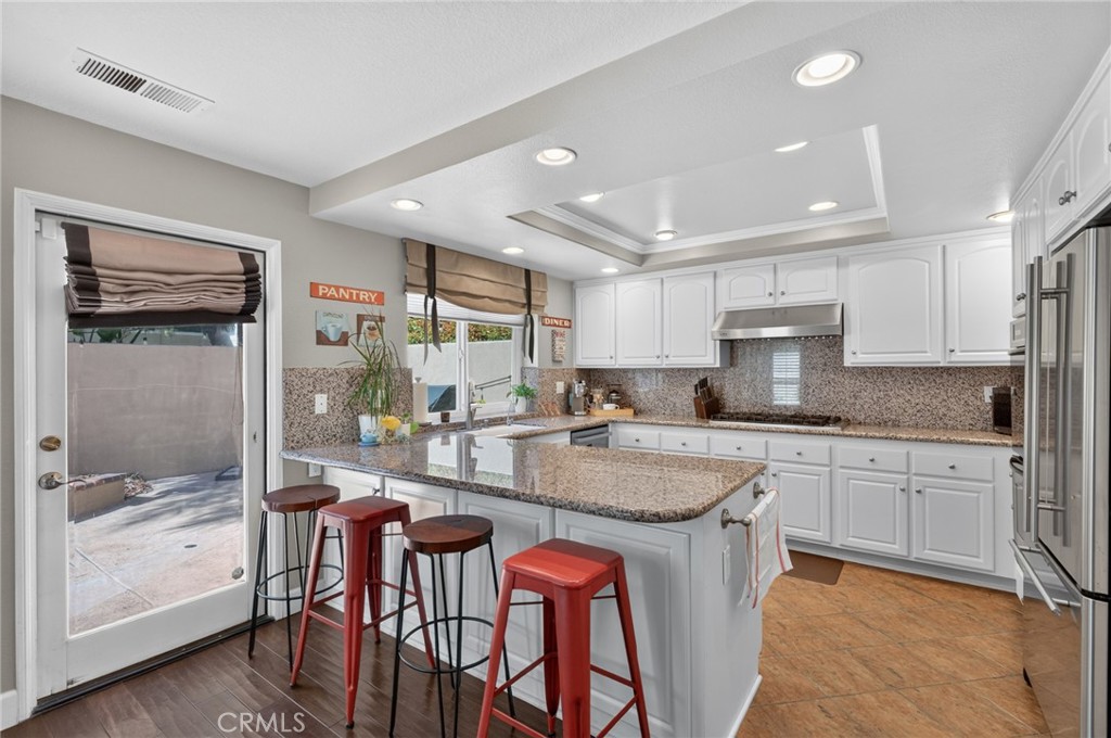Access to wrap-around yard from family room/kitchen - 7 Posada, Irvine CA 92614 - photo 16