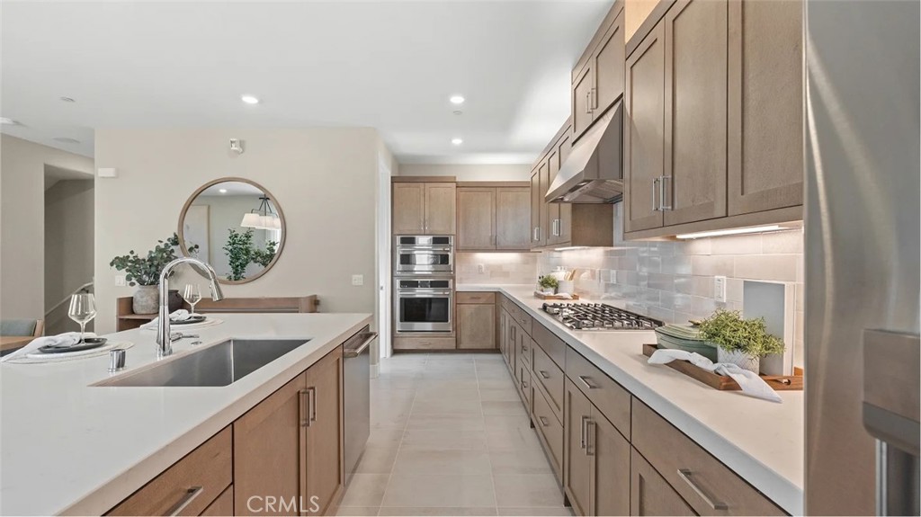 Photos shown are of model only- not actual homesite. - 705 Sonia, Irvine CA 92618 - photo 2