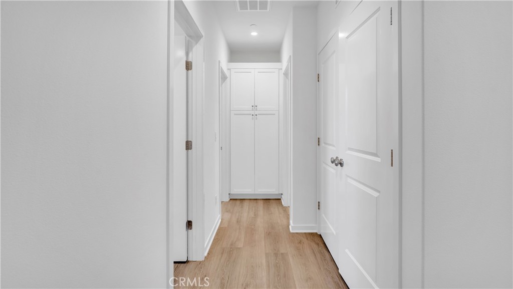Hallway w/ Laundry Closet - 747 Spring Garden, Irvine CA 92618 - photo 28