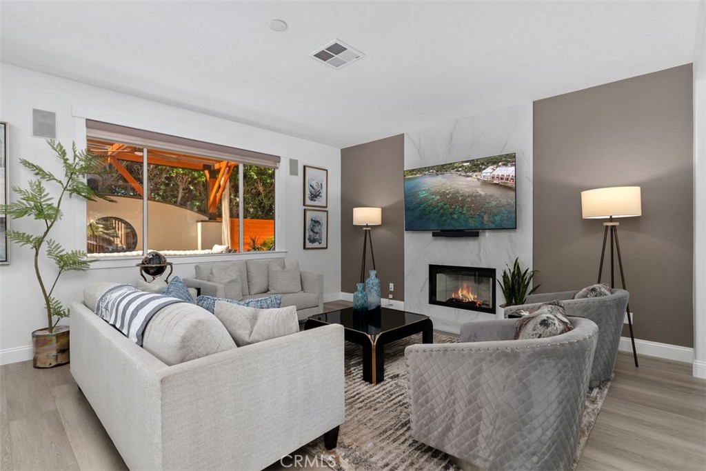 Updated fireplace - 8 National Place, Irvine CA 92602 - photo 10