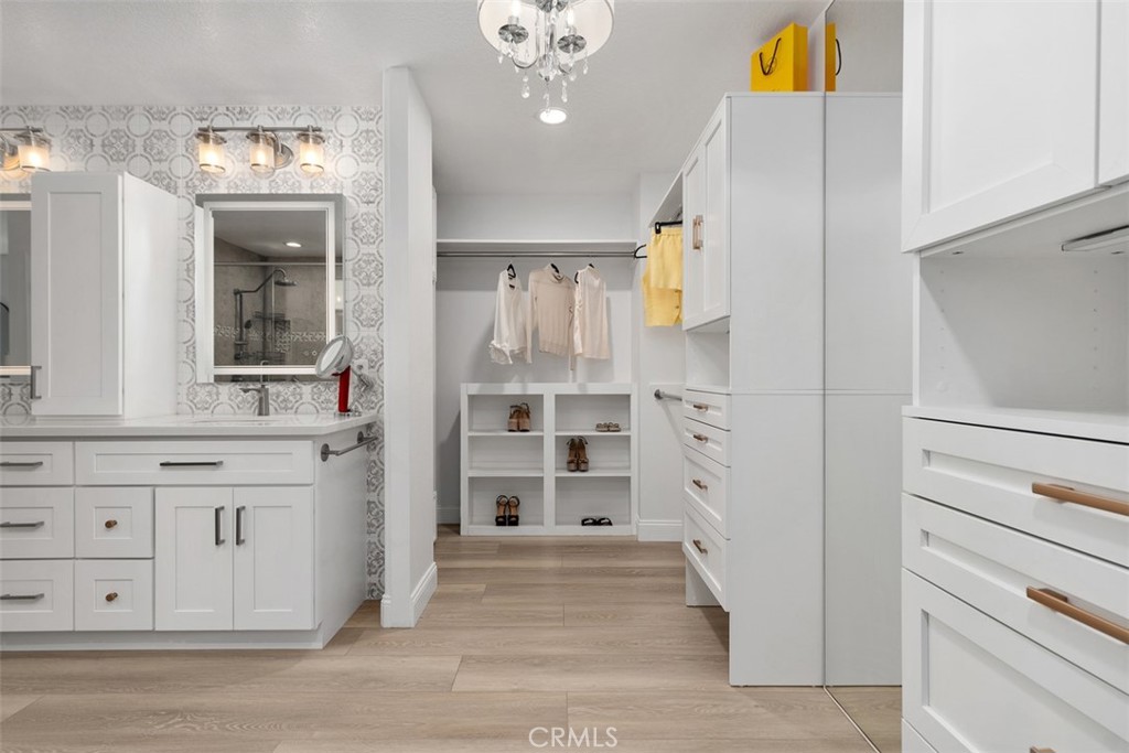 Walk-in closet - 8 National Place, Irvine CA 92602 - photo 30