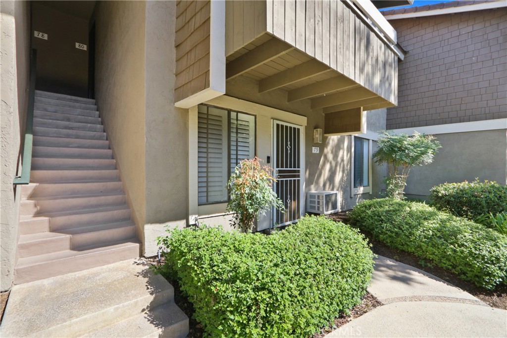 Unit #80 is upstairs, to the right. - 80 Streamwood, Irvine CA 92620 - photo 17