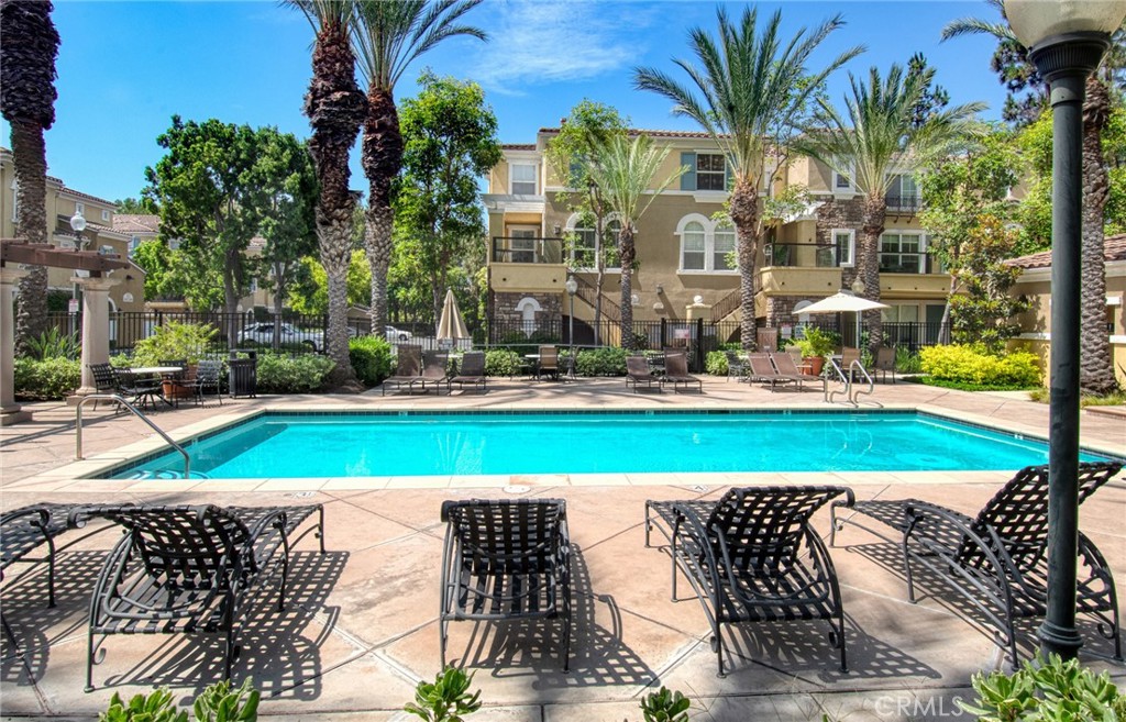 Pool located off entrance to building. - 808 Terra Bella, Irvine CA 92602 - photo 15