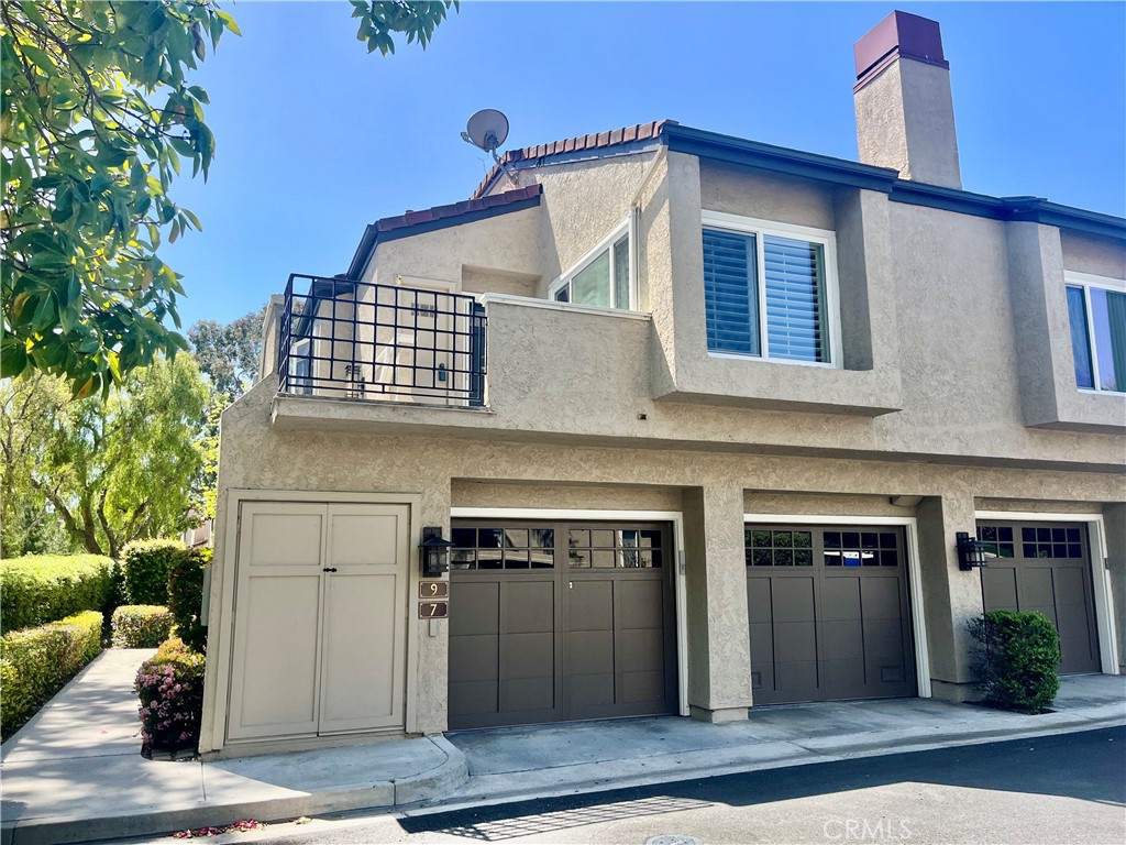 End-unit, top level - 9 Stanford Court 102, Irvine CA 92612 - photo 1
