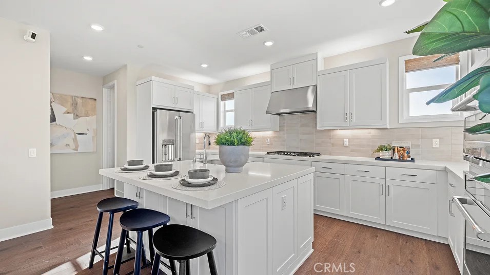 Photos shown are of model only- not actual homesite. - 920 Chinon, Irvine CA 92618 - photo 1