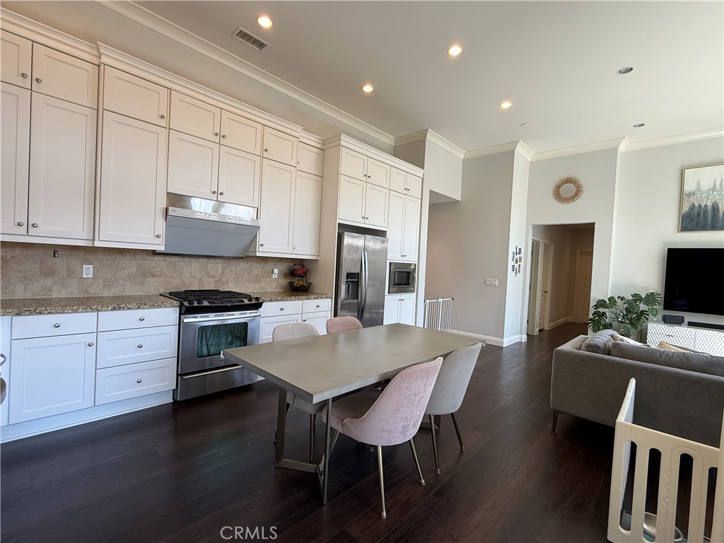 Living/Dining/Kitchen Area - 93 Thornhurst, Irvine CA 92620 - photo 3