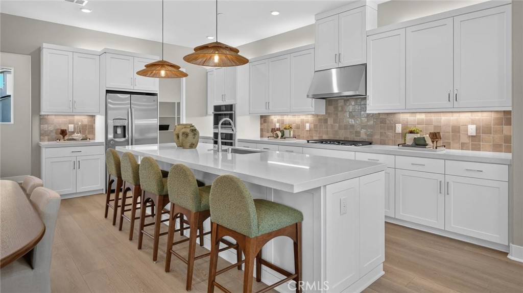 Photos shown are of model only- not actual homesite. - 933 Chinon, Irvine CA 92618 - photo 3