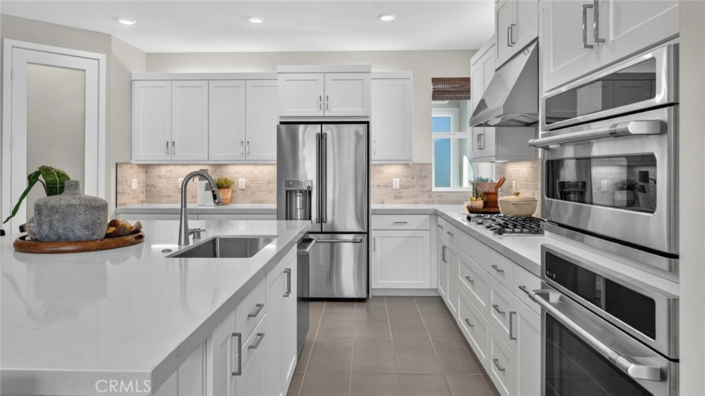 Photos shown are of model only- not actual homesite. - 933 Treble, Irvine CA 92618 - photo 2
