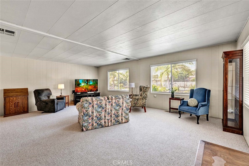 Spacious open living area with beautiful view of pool - 1001 W Lambert 30, La Habra CA 90631 - photo 6