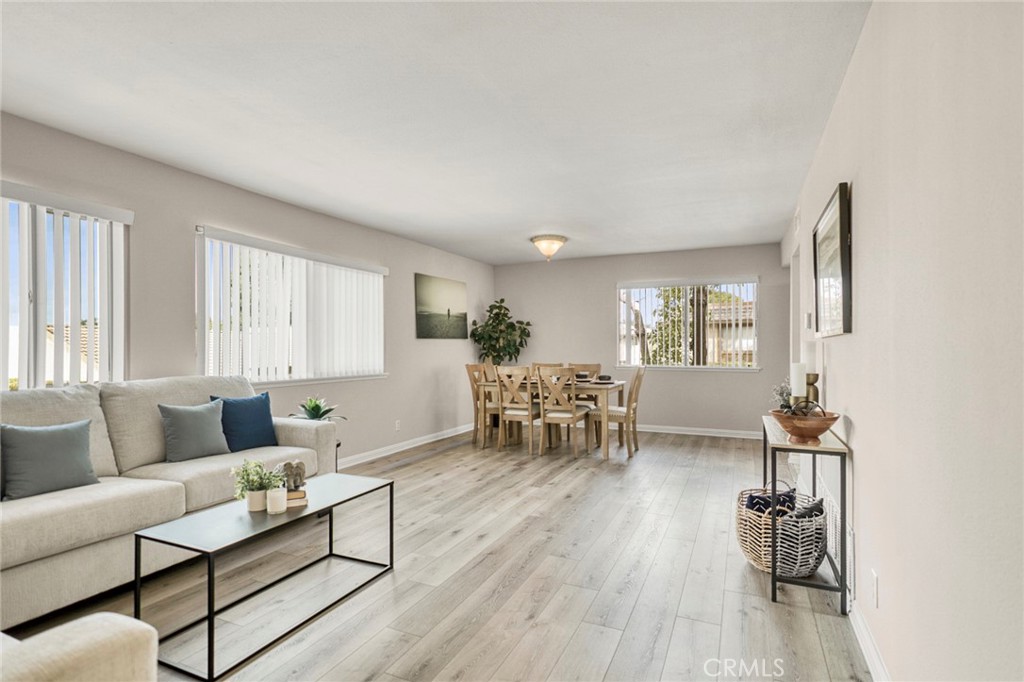 An abundance of windows fills the interior with natural light, creating a bright and welcoming atmosphere throughout. - 1064 Las Lomas Drive D, La Habra CA 90631 - photo 7