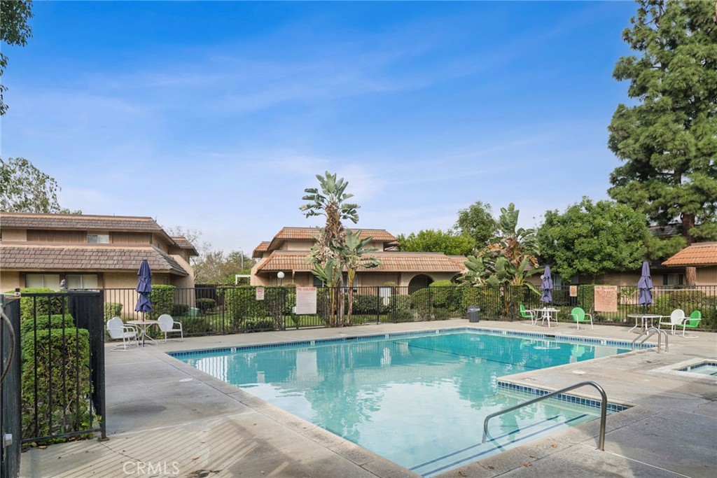 Residents can enjoy the community's gated swimming pool and spa, along with a clubhouse offering space to relax and unwi - 1064 Las Lomas Drive D, La Habra CA 90631 - photo 19