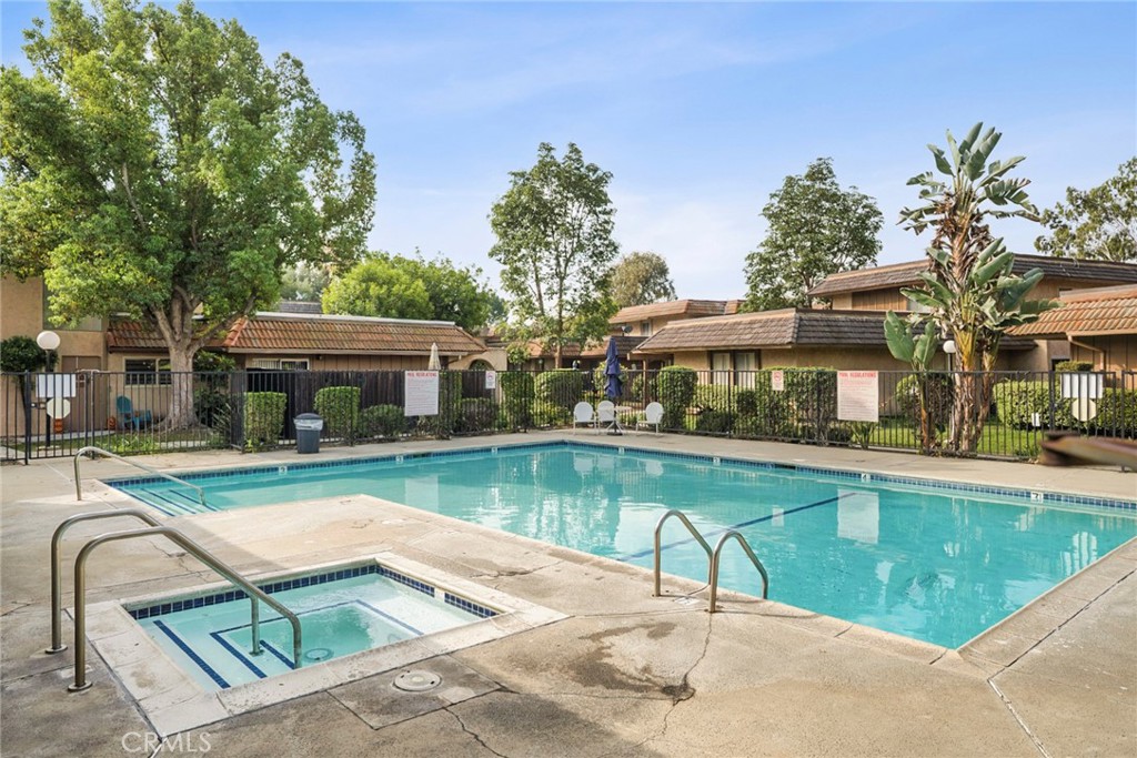 With sunnier weather comes a desire to head outdoors. Cool off in this sparkling pool - 1064 Las Lomas Drive D, La Habra CA 90631 - photo 20